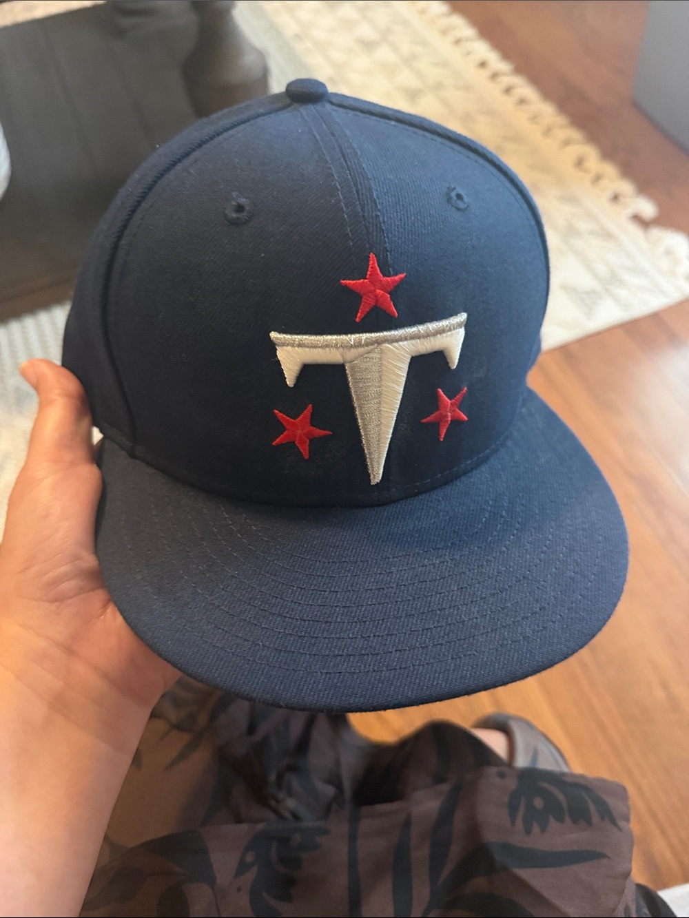 Navy Snapback Hat with White 'T' and Red Stars